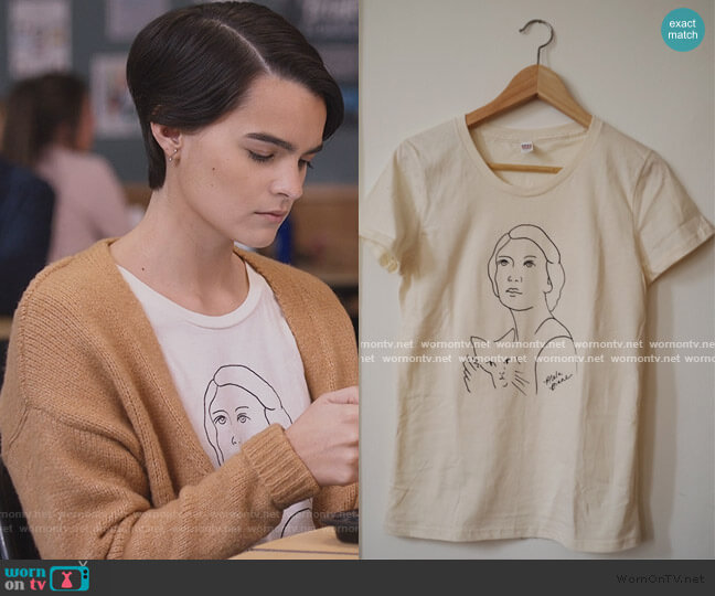 Alela Diane Self Portrait T-shirt worn by Elodie Davis (Brianna Hildebrand) on Trinkets