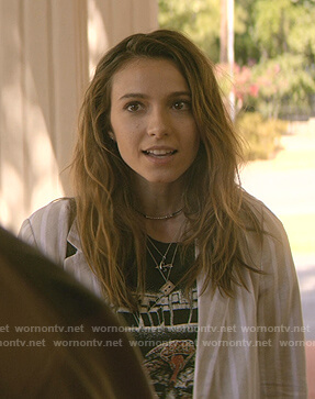 Blair’s black graphic print tee on Teenage Bounty Hunters