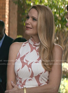 Debbie’s white and pink printed mock neck dress on Teenage Bounty Hunters