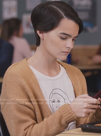 Elodie’s white portrait print tee on Trinkets