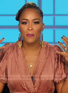 Eve’s copper ruffle trim dress on The Talk