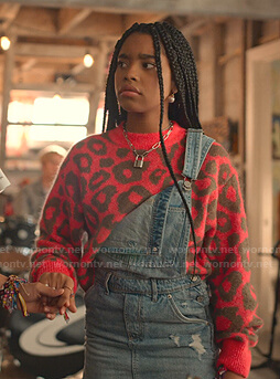 Flynn’s pink leopard print sweater on Julie and the Phantoms