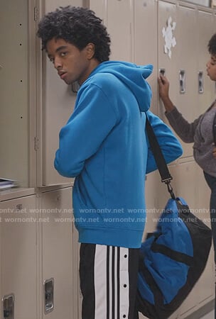 Noah’s black Adidas track pants on Trinkets