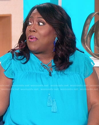 Sheryl’s blue tassel tie top on The Talk