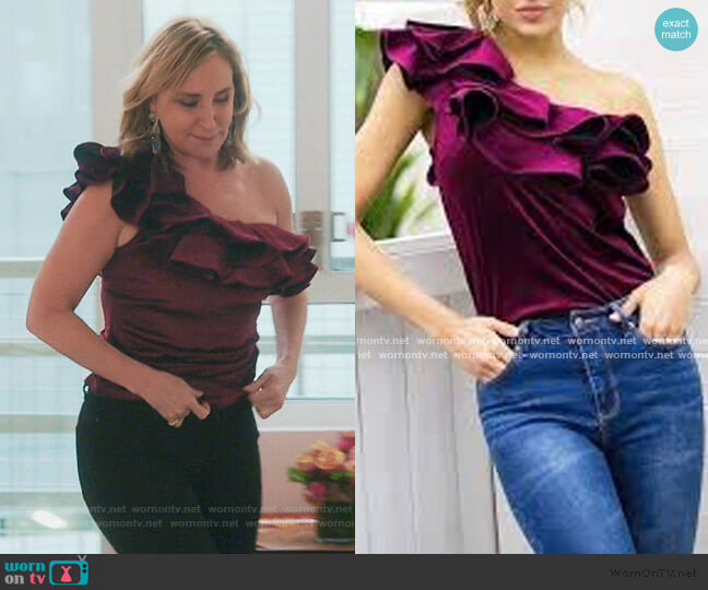 Sonja Ruffle Off Shoulder Top worn by Sonja Morgan on The Real Housewives of New York City