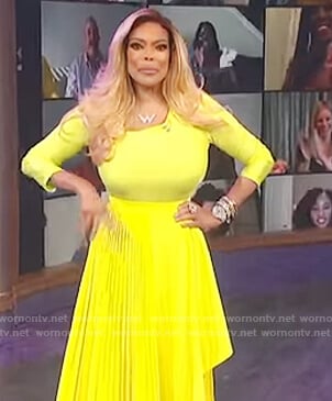 Wendy’s yellow asymmetric top and pleated skirt on The Wendy Williams Show