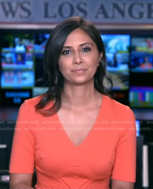 Zohreen Shah’s coral pink ribbed waist dress on Good Morning America
