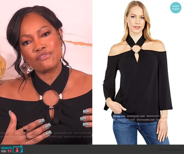 Michael Kors Ring Twist Neck Top worn by Garcelle Beauvais on The Real
