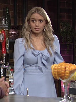 Abby’s blue tie neck dress on The Young and the Restless