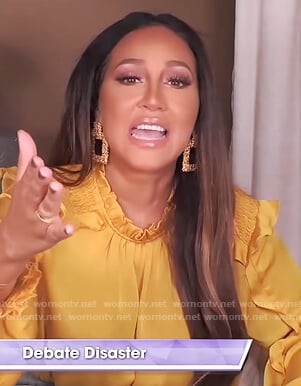Adrienne’s yellow satin ruffle top on The Real