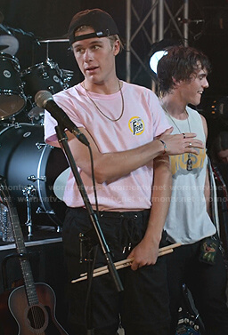 Alex’s pink Fresh print tee and black pants on Julie and the Phantoms
