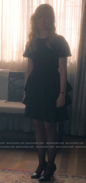 Dani’s black tiered mini dress on The Haunting of Bly Manor