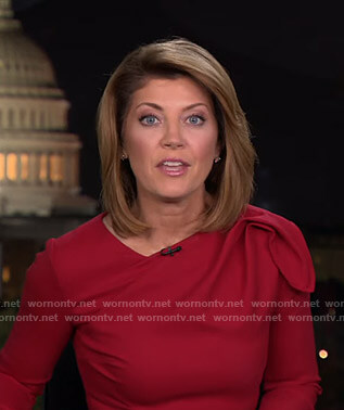 Norah’s red gathered shoulder dress on CBS Evening News