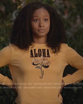 Olivia’s yellow floral embroidered sweatshirt on Black-ish