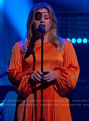 Kelly’s orange pleated satin dress on The Kelly Clarkson Show