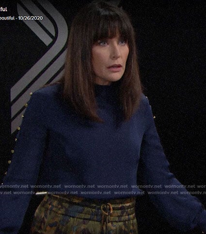 Quinn’s blue studded blouse and camo print skirt on The Bold and the Beautiful