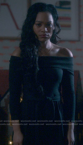 Rebecca’s black off-shoulder dress on The Haunting of Bly Manor