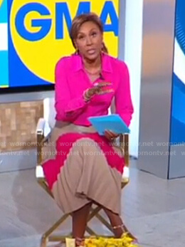 Robin’s pink shirt and colorblock pleated skirt on Good Morning America