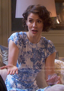 Sarah’s white and blue floral cap-sleeve dress on Days of our Lives