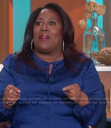 Sheryl’s blue satin keyhole blouse on The Talk
