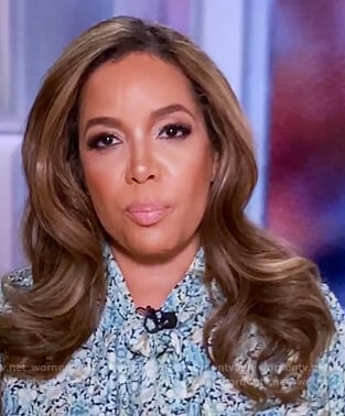 Sunny’s blue floral tie neck blouse on The View