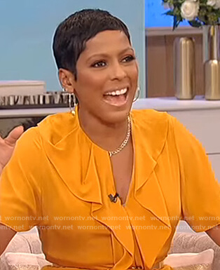 Tamron’s yellow ruffle front dress on Tamron Hall Show