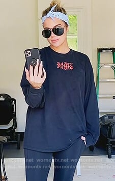 Khloe’s black Saint Pablo tee and leggings on Keeping Up with the Kardashians