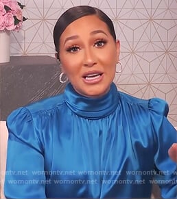 Adrienne’s blue satin turtleneck blouse on The Real