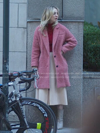 Cassie’s pink textured coat on The Flight Attendant