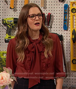 Drew’s red ruffle front blouse on The Drew Barrymore Show