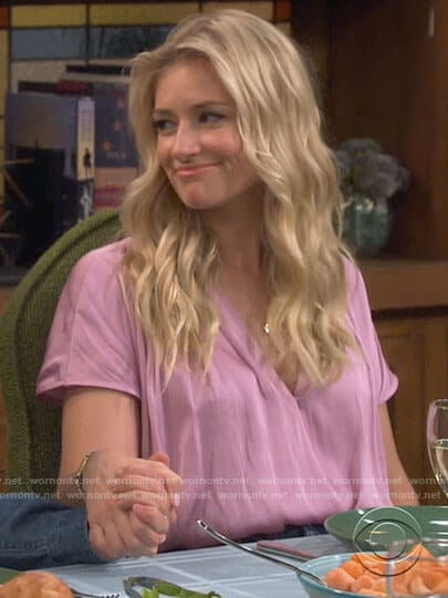 Gemma’s pink short sleeved top on The Neighborhood