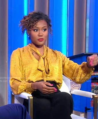 Janai’s yellow crocodile print tie neck blouse on Good Morning America