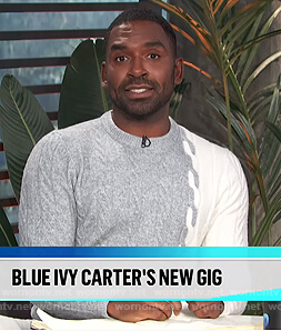 Justin’s gray colorblock cable knit sweater on E! News Daily Pop
