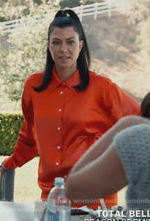 Kourtney’s orange satin shirt on Keeping Up with the Kardashians