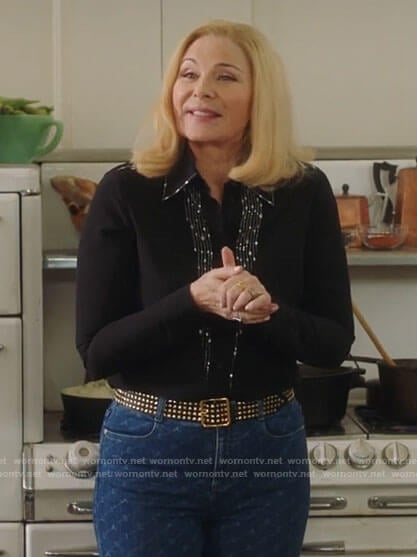 Margaret’s black embellished blouse and monogram jeans on Filthy Rich