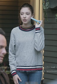 Natalie’s gray stripe trim sweatshirt on The Unicorn