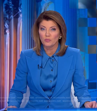 Norah’s blue satin shirt and peak lapel blazer on CBS Evening News