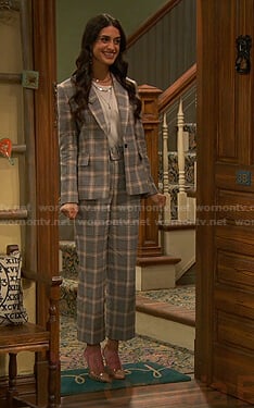Priya’s grey plaid suit on Ravens Home