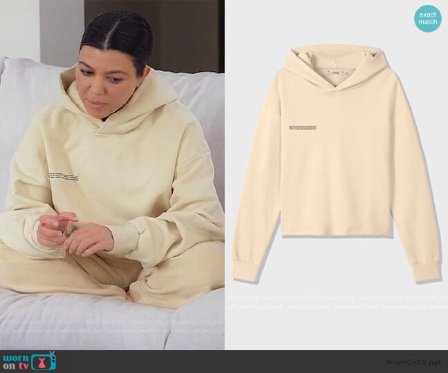 The Pangaia Organic Cotton Loose Hoodie Vanilla worn by Kourtney Kardashian on Keeping Up with the Kardashians