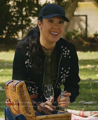 Sherri’s black floral jacket and olive blouse on All Rise