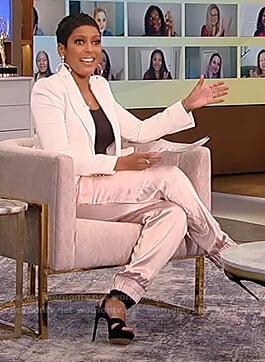 Tamron’s pink satin pants and white blazer on Tamron Hall Show