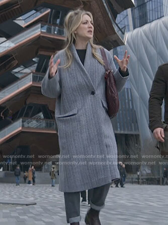 Cassie’s grey coat on The Flight Attendant