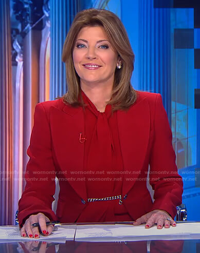Norah’s red chain embellished blazer on CBS Evening News