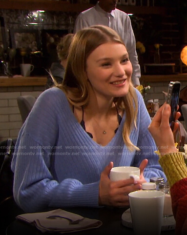 Alie’s blue v-neck sweater on Days of our Lives