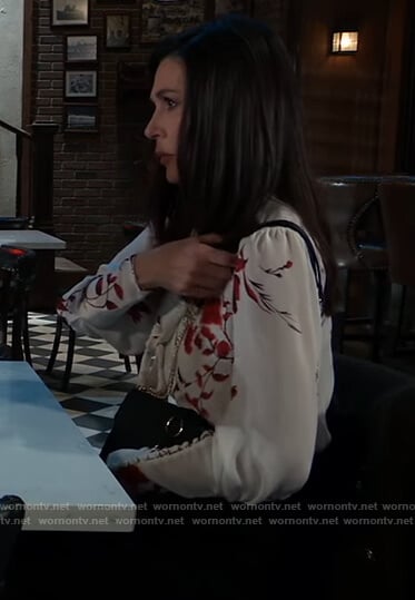 Anna’s red and white floral tie neck blouse on General Hospital