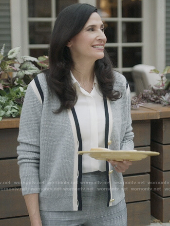Delia’s gray stripe trim cardigan on The Unicorn
