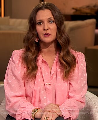 Drew’s pink tie neck printed blouse on The Drew Barrymore Show