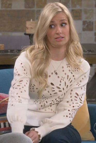 Gemma’s white eyelet sweater on The Neighborhood