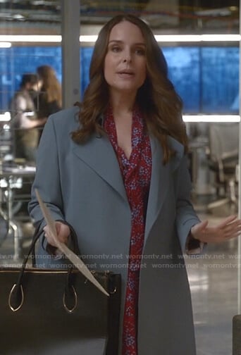 Izzy’s red floral tie neck dress on Bull