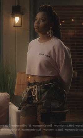 Jazlyn’s pink cropped Girls Tour sweatshirt on Grown-ish